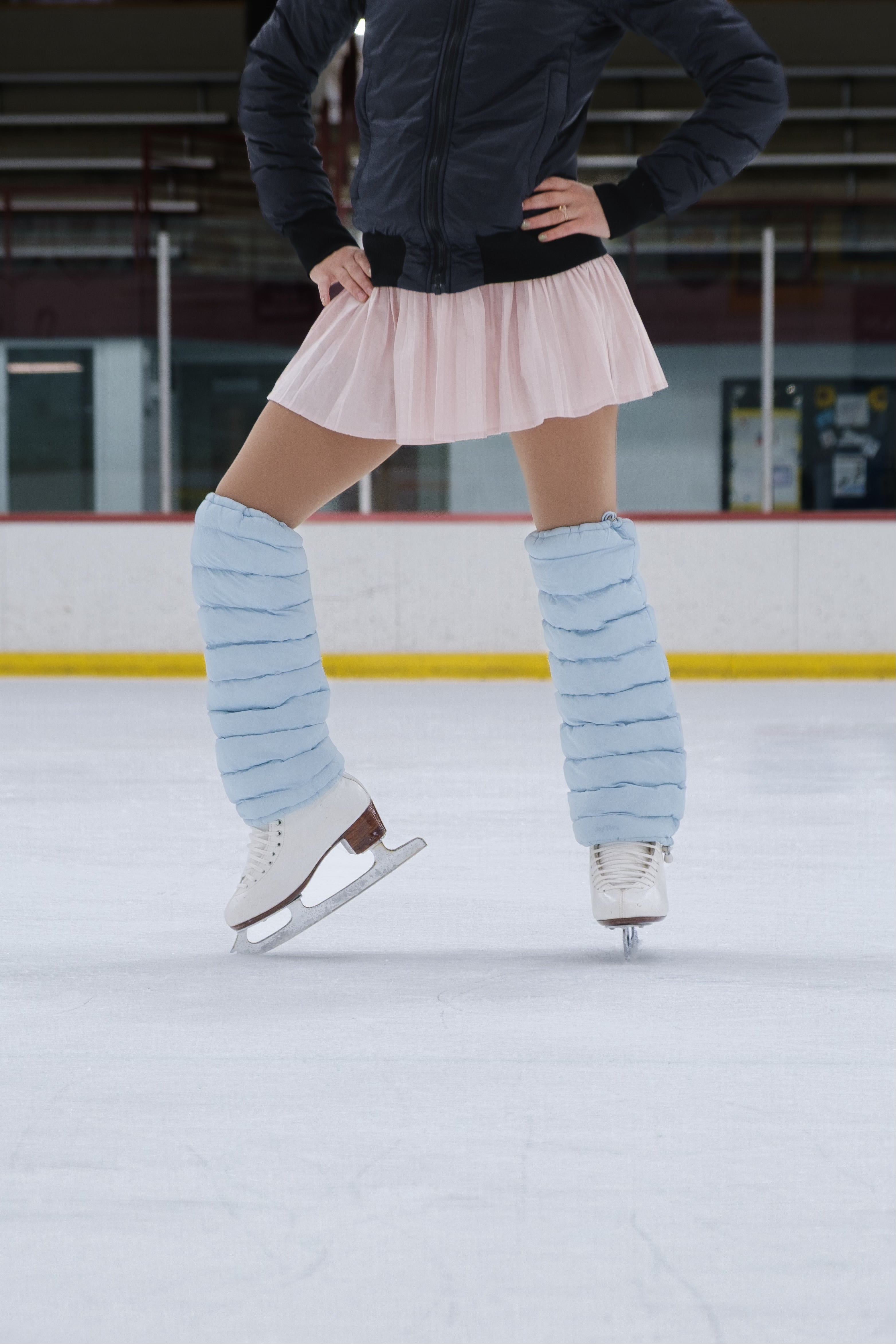 Figure skater on ice wearing Sky LegPuffs