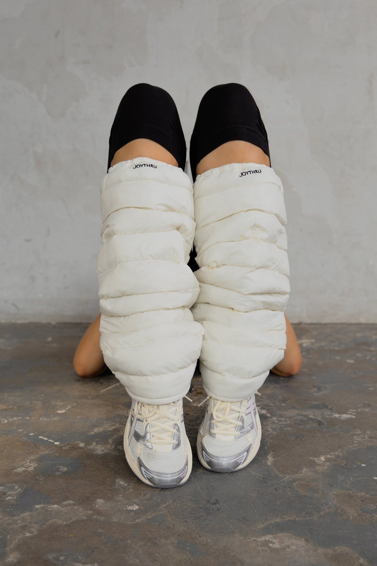 Frost LegPuffs puffer leg warmers worn in the studio