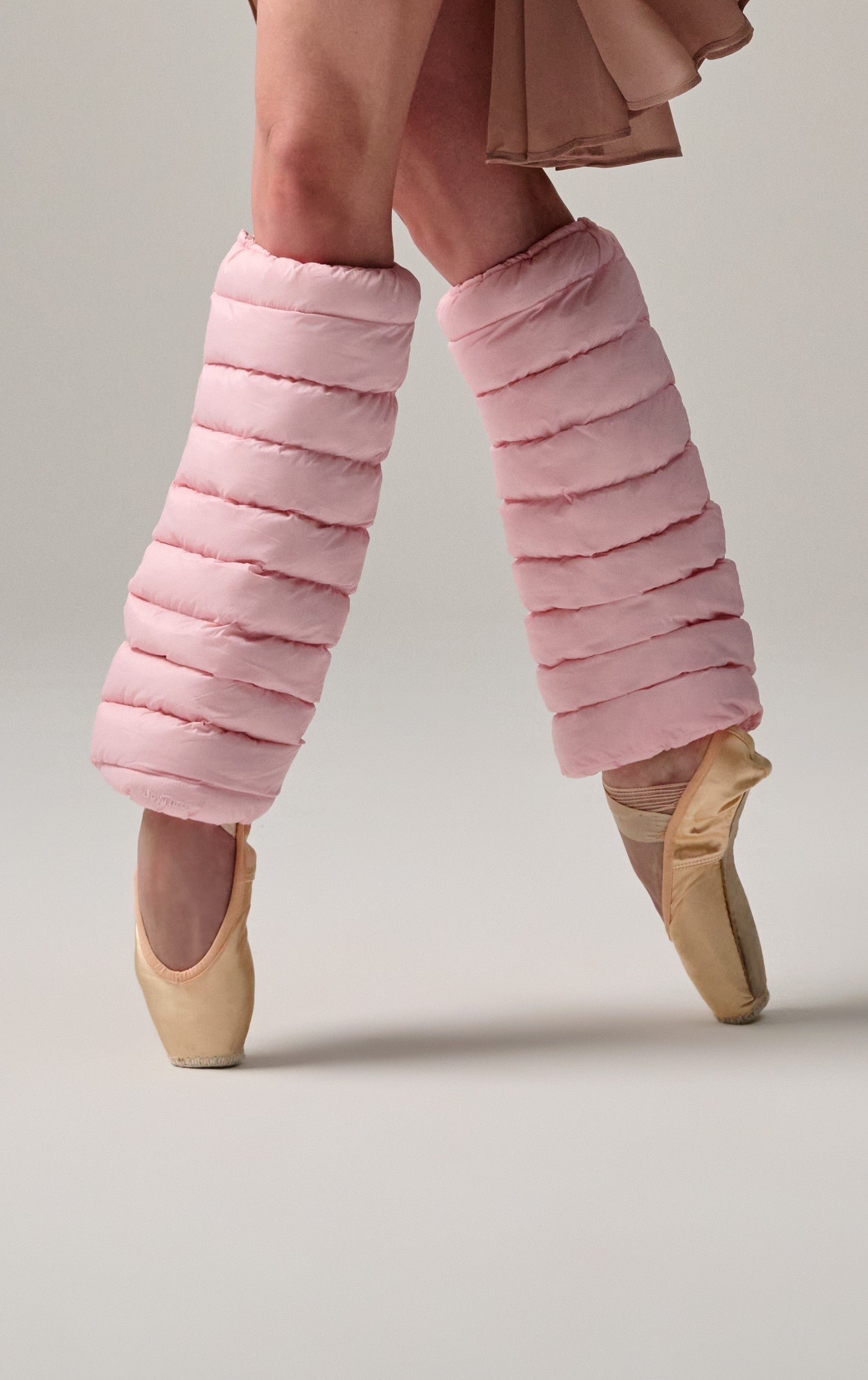 Dancer's legs in Blush LegPuffs standing en pointe