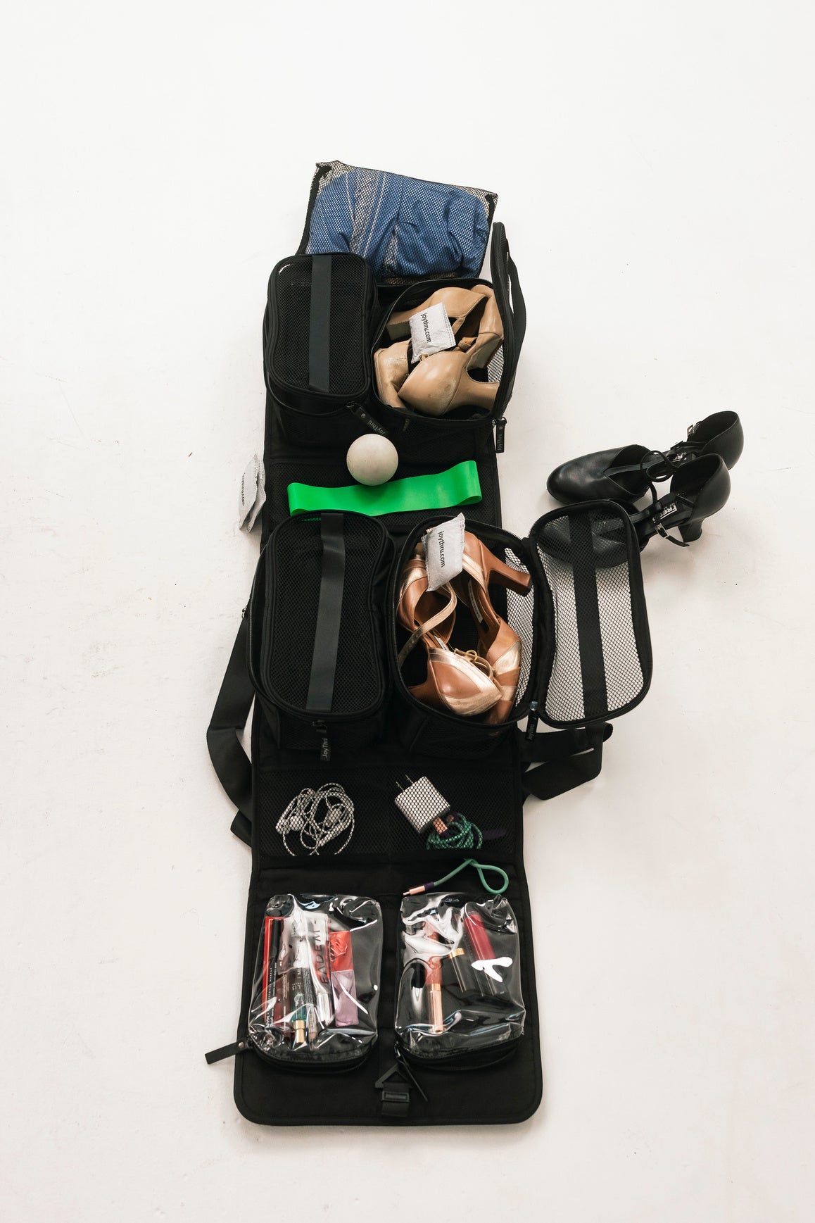 JoyThru Dance Bag Organizer open and fully loaded with shoes and dance essentials